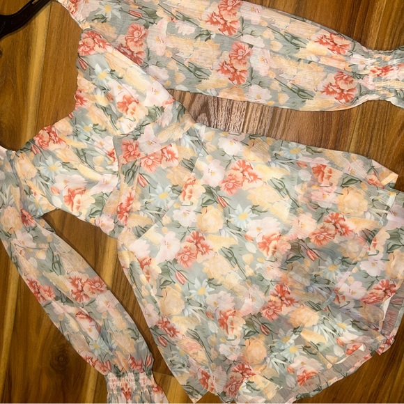 NWOT Floral Long Sleeve Romper with tie in the back and smocked sleeves - Picture 2 of 8